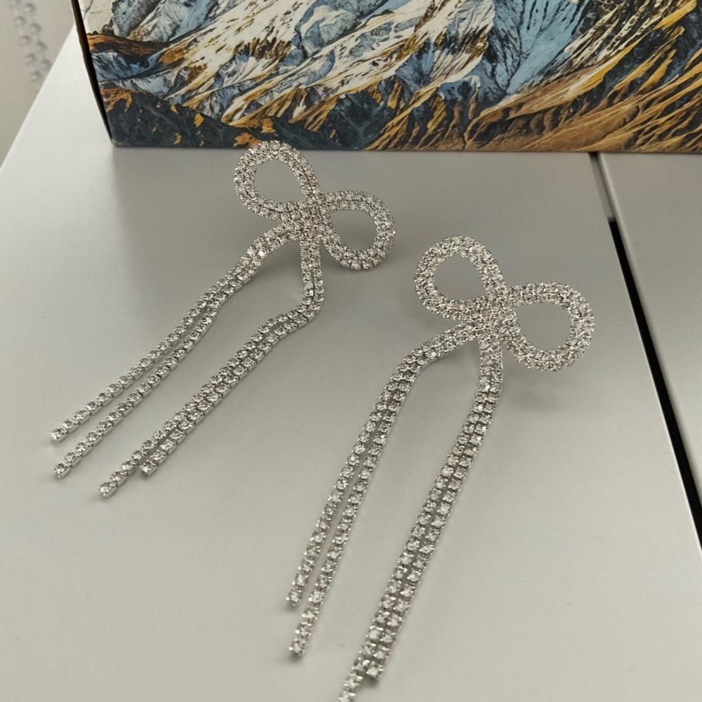 Sparkling Silver Bow Dangle Earrings